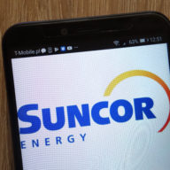 Suncor (NYSE:SU) Paring Costs to Support Profit