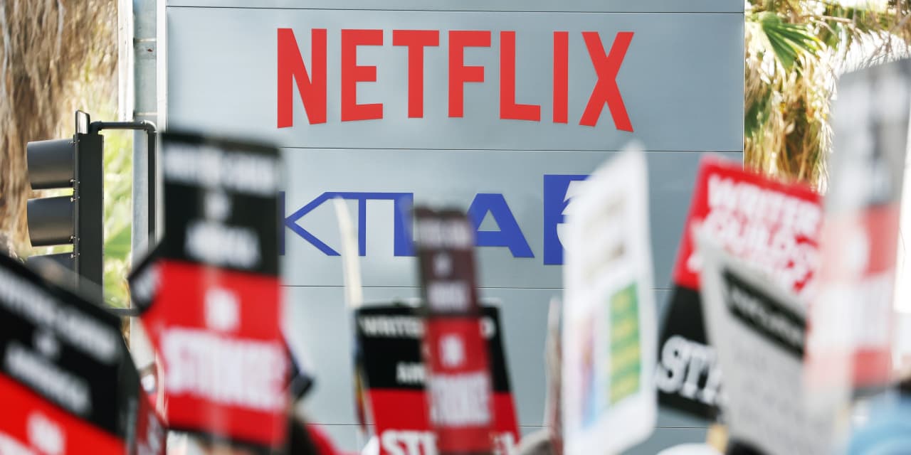 Paramount Global and Netflix stock boosted by possible end to writer''s strike as Nike shares slip on downgrade