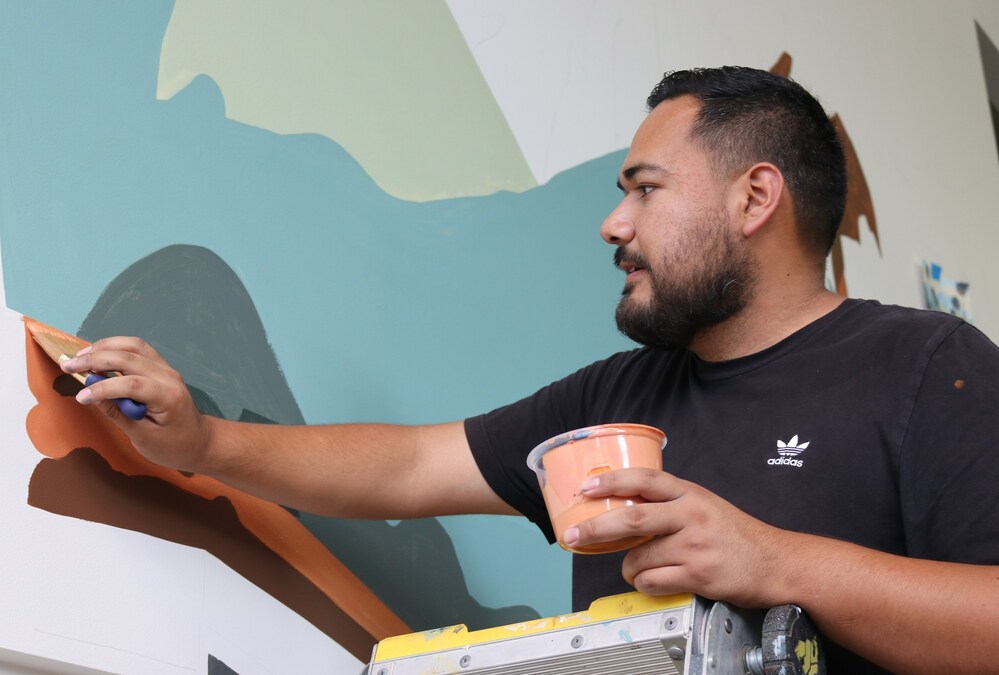 Inland Empire Health Plan launches collaboration with Riverside muralist Juan Navarro